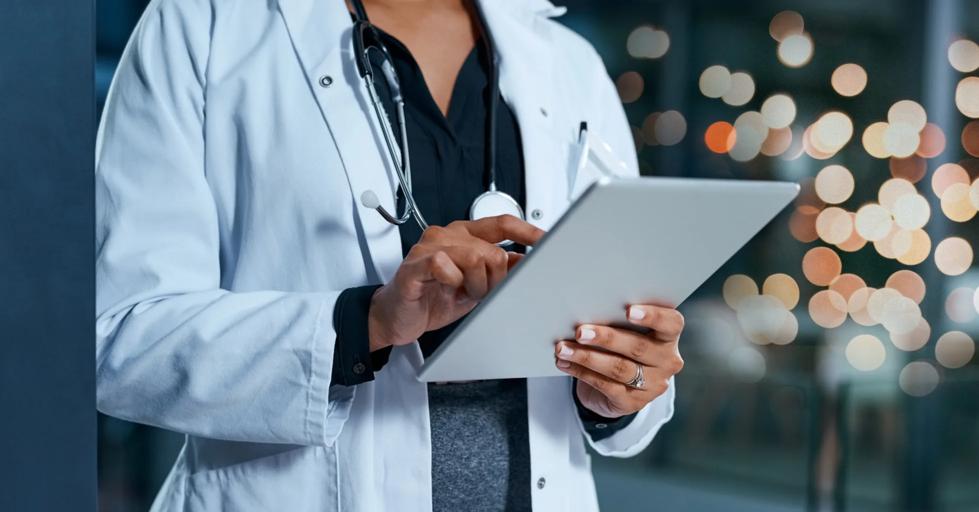 Doctor holding a tablet.